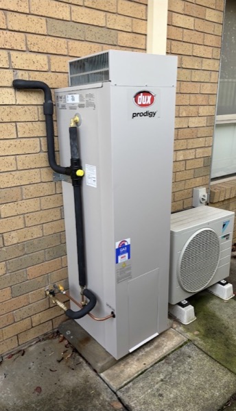 A Dux gas storage hot water unit and its pipework installed at a Ballarat home