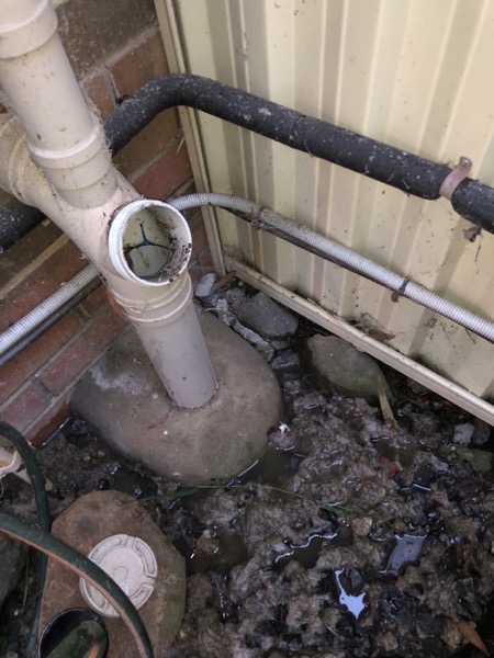 Waste pipework at the side of a house